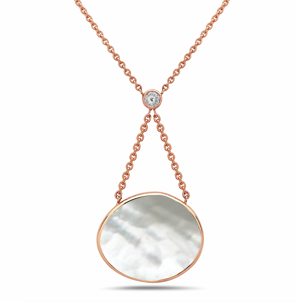 irini expression necklace, mother of pearl paired with bezel set diamond, keeps your intuition clear and focused on the forward.