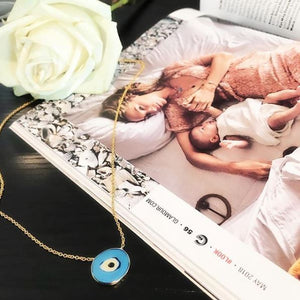 IRINI EVIL EYE, ENAMEL SWIRL OF PROTECTION CLOSE TO YOUR HEART, NECKLACE, GOLD, SILVER, PROTECTION IN GLAMOUR MAGAZINE